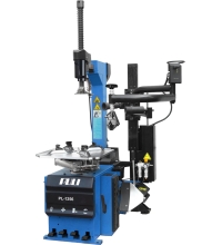Tyre changer with pneumatic help arm system
