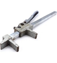 Manual tire spreader-expander ratchet type